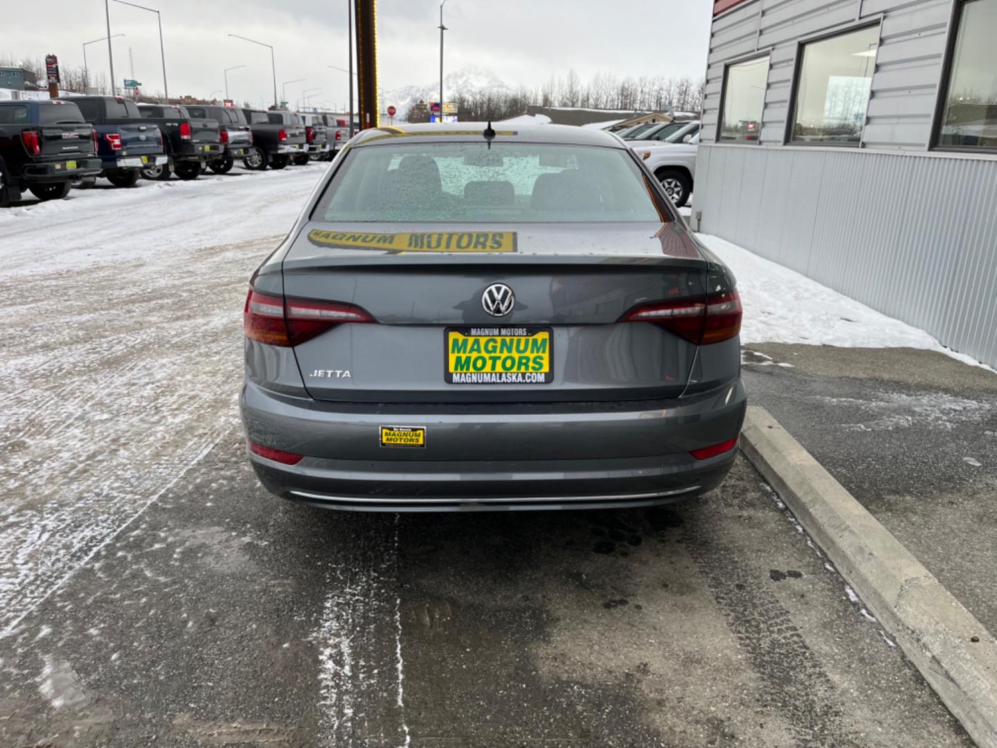 2019 Gray /Black Volkswagen Jetta 1.4T SE 8A (3VWC57BU8KM) with an 1.4L L4 DOHC 20V engine, 8A transmission, located at 1960 Industrial Drive, Wasilla, 99654, (907) 274-2277, 61.573475, -149.400146 - Photo#4